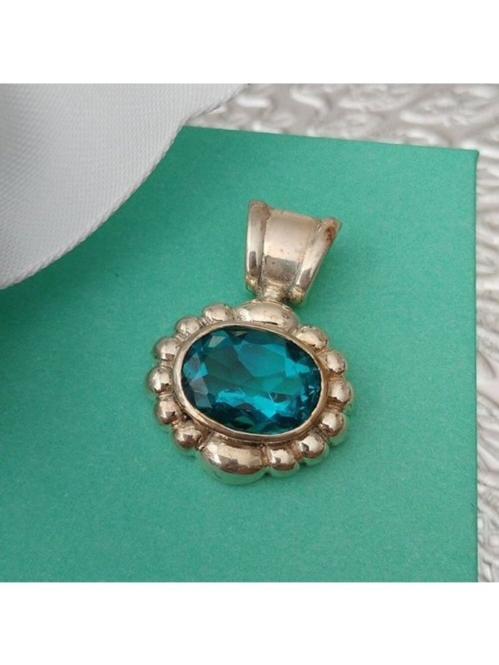 Sterling Silver Blue Topaz Oval Pendant